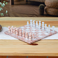 Marble and onyx chess set, 'Riveting Challenge' - Modern Hand-Carved White Onyx and Pink Marble Chess Set
